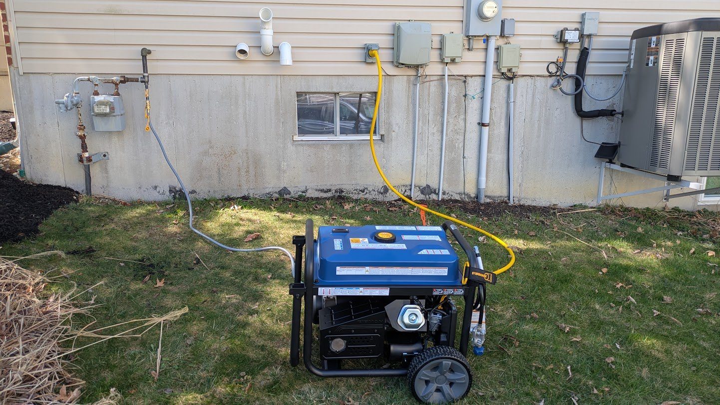 Portable standby generator connected to a home with transfer setup by Benrishi Electrical